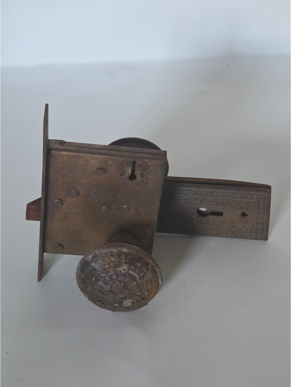 Russell And Erwin Cast Iron Mortise Lockset With Ornate Backplates And Knobs
